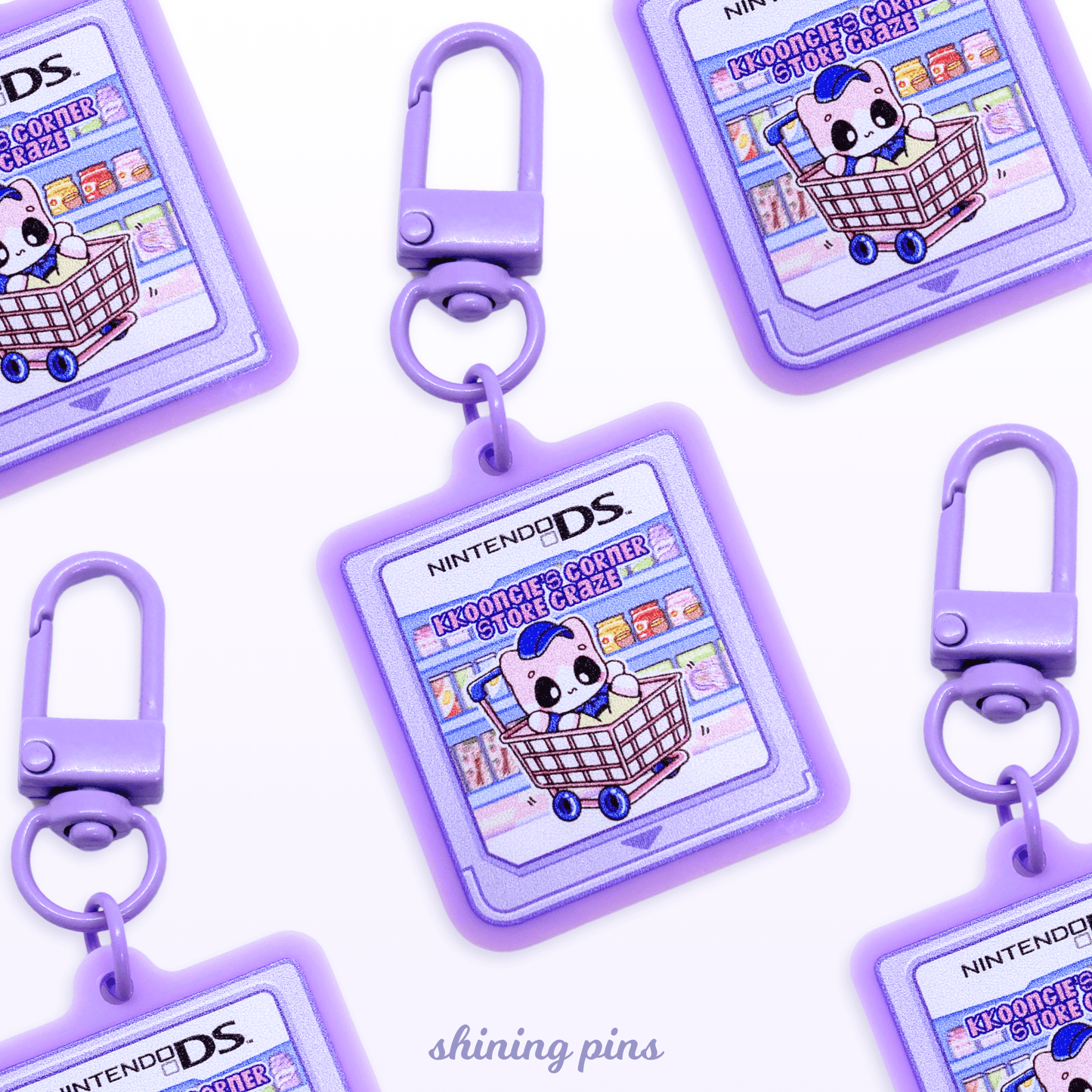 'Kkoongie's Corner Store Craze' Game Cartridge Keychain Art print acrylic keychains & pins, kkoongie and friends, shop new in Shining Pins
