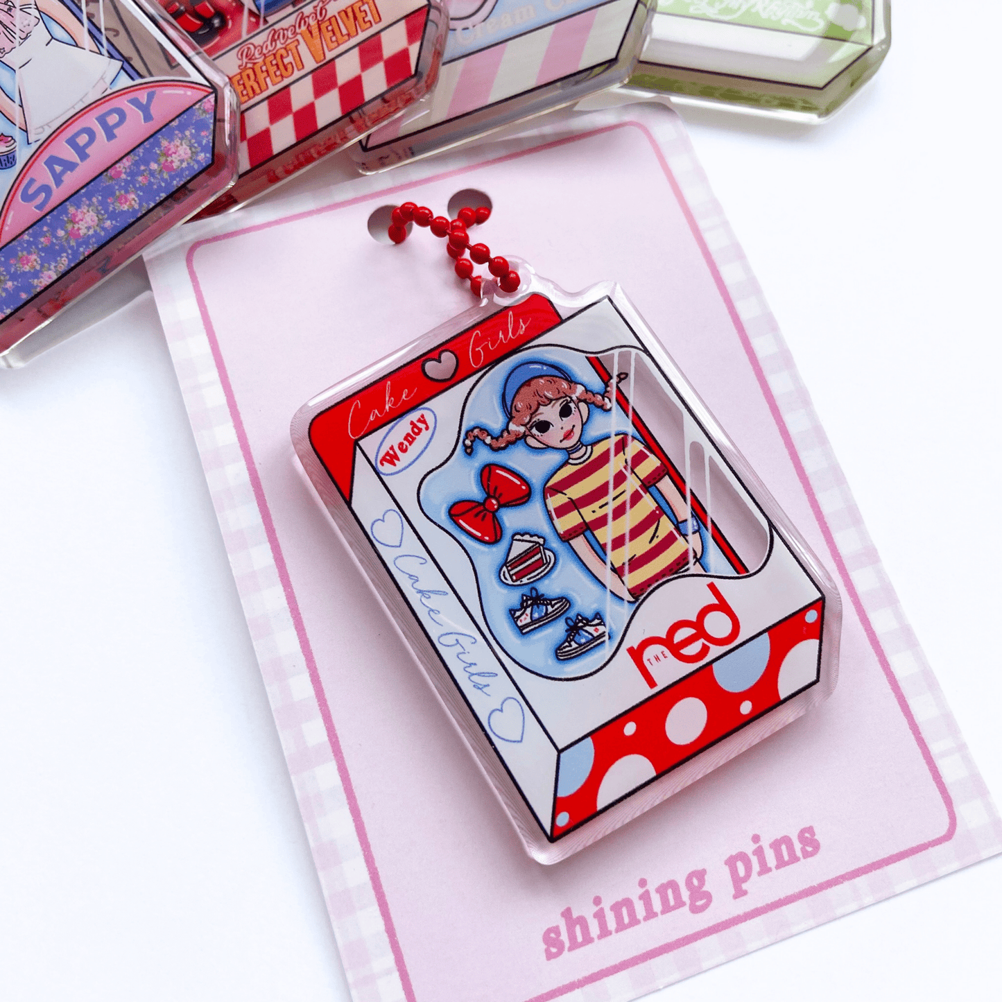 Wendy Doll 'Dumb Dumb' Keychain Acrylic Keychain acrylic keychains & pins, red velvet, restock Shining Pins